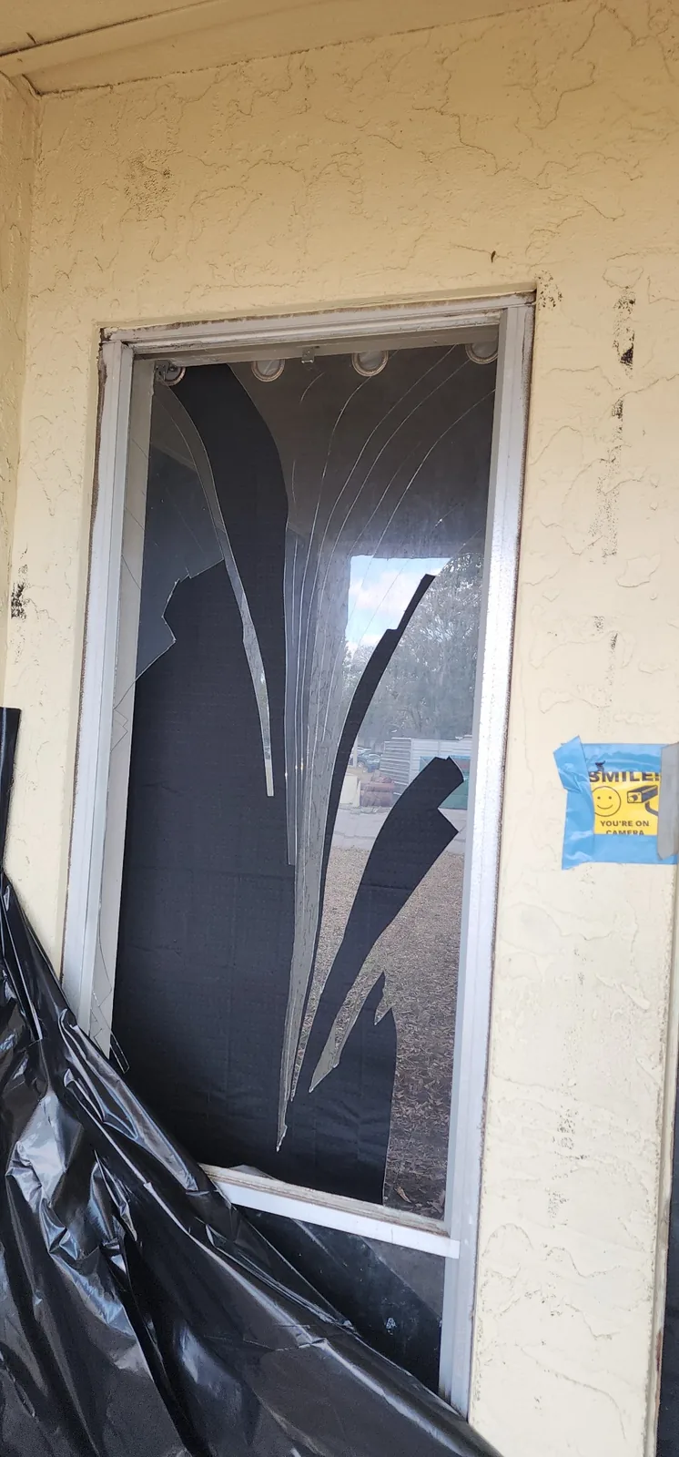Broken screen door before repair