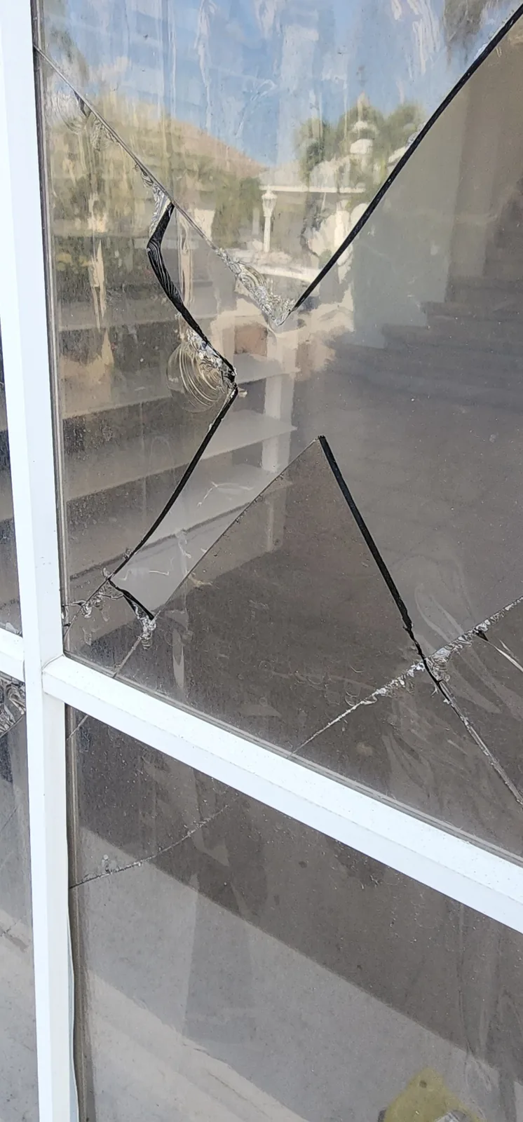 Broken window glass ready for replacement