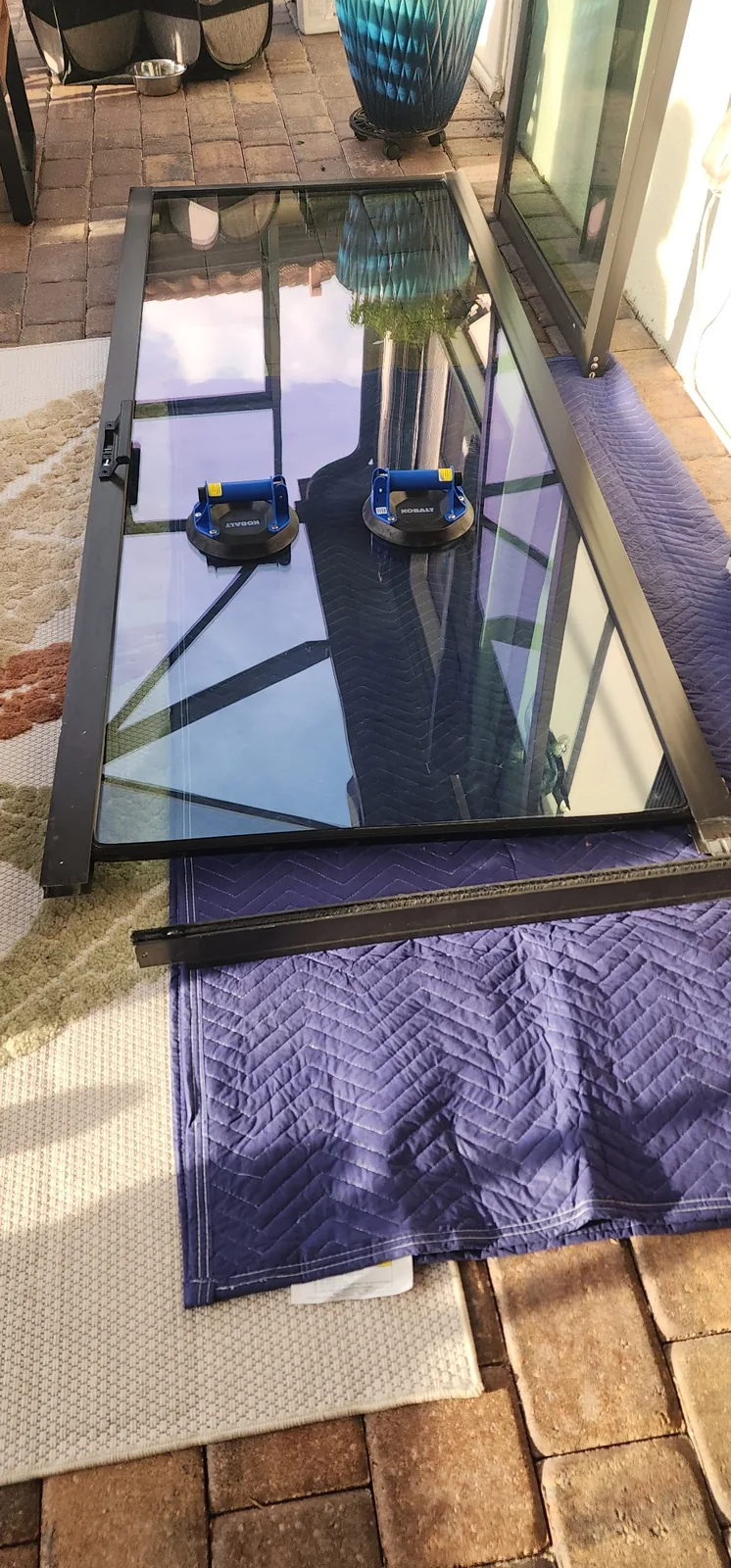Sliding glass door panel removed for repair