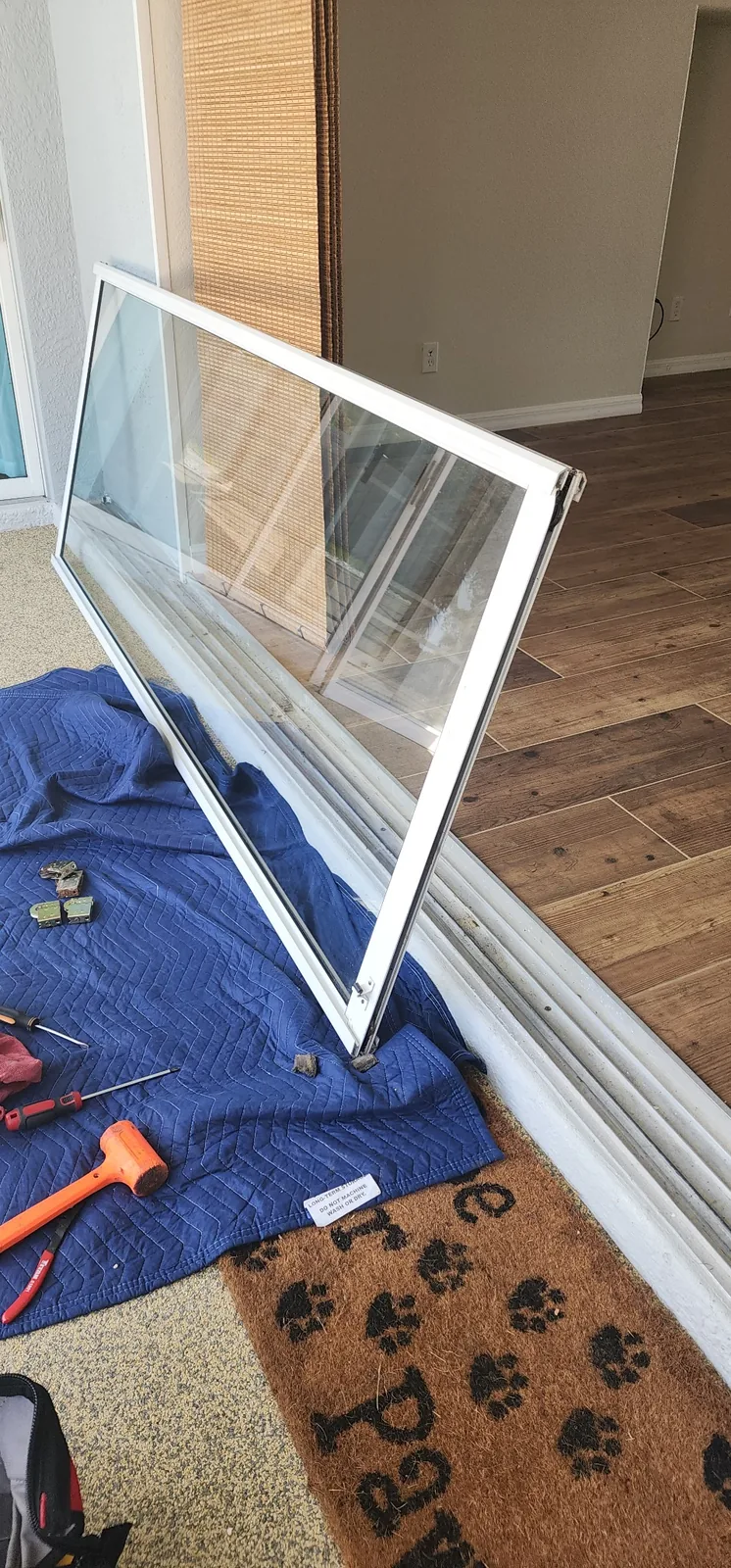 Glass panel removed during sliding door repair
