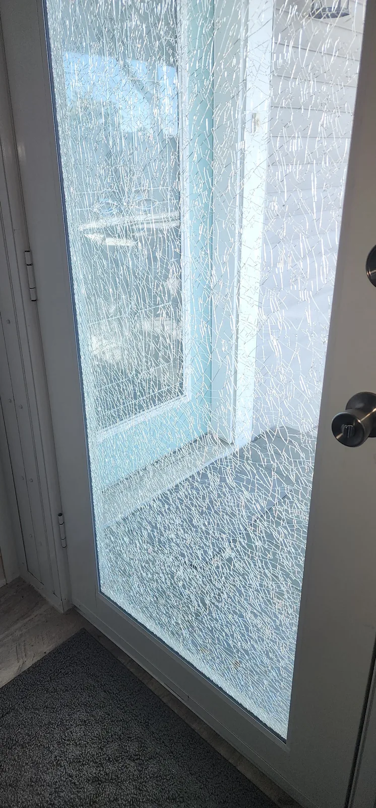 Shattered door glass before replacement